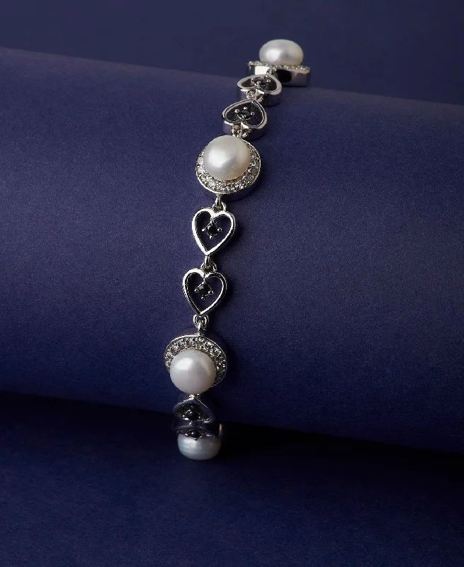 Ladies bracelets standout designs-Graceful Stone Studded Metallic Pearl Bracelet