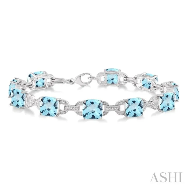 Ladies bracelets exclusive editions-7x7 mm Cushion Cut Blue Topaz and 1/20 Ctw Round Cut Diamond Fashion Bracelet in Sterling Silver