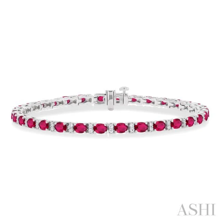 Ladies bracelets winter designs-1/3 ctw Oval Cut 4X3MM Ruby and Round Cut Diamond Precious Bracelet in 14K White Gold