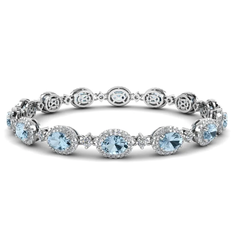 Ladies bracelets best brands-Oval Shape 9 Carat Aquamarine Center Featuring Diamond Halo Bracelet BRHAOCA