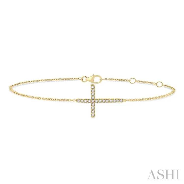 Ladies bracelets youthful looks-1/8 ctw Petite Reclined Cross Round Cut Diamond Fashion Bracelet in 10K Yellow Gold