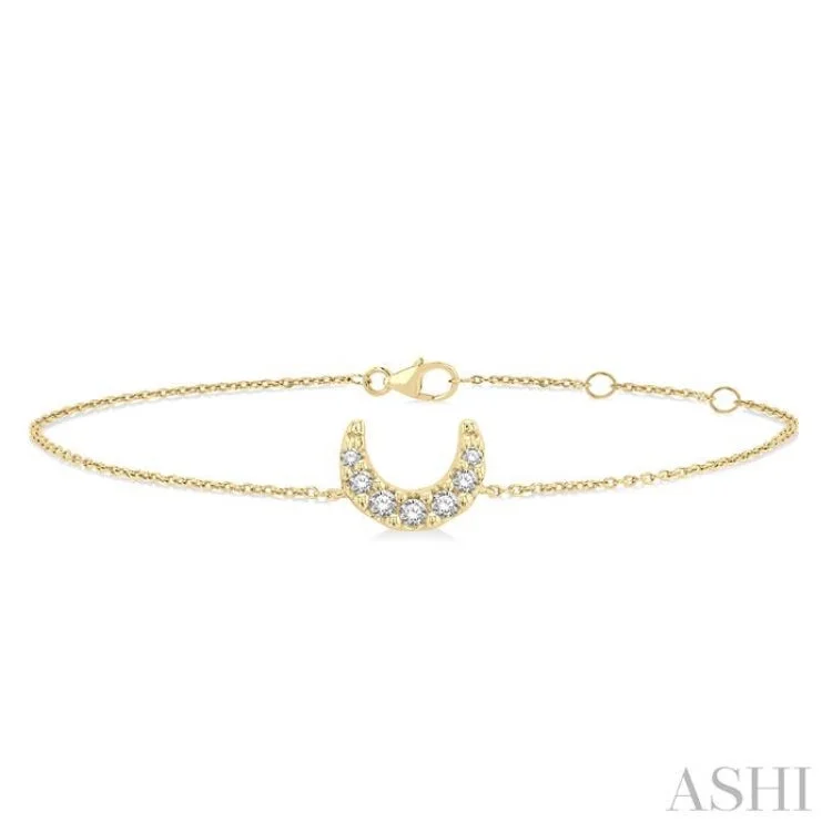 Ladies bracelets charm pieces-1/20 ctw Petite Crescent Moon Round Cut Diamond Fashion Bracelet in 10K Yellow Gold