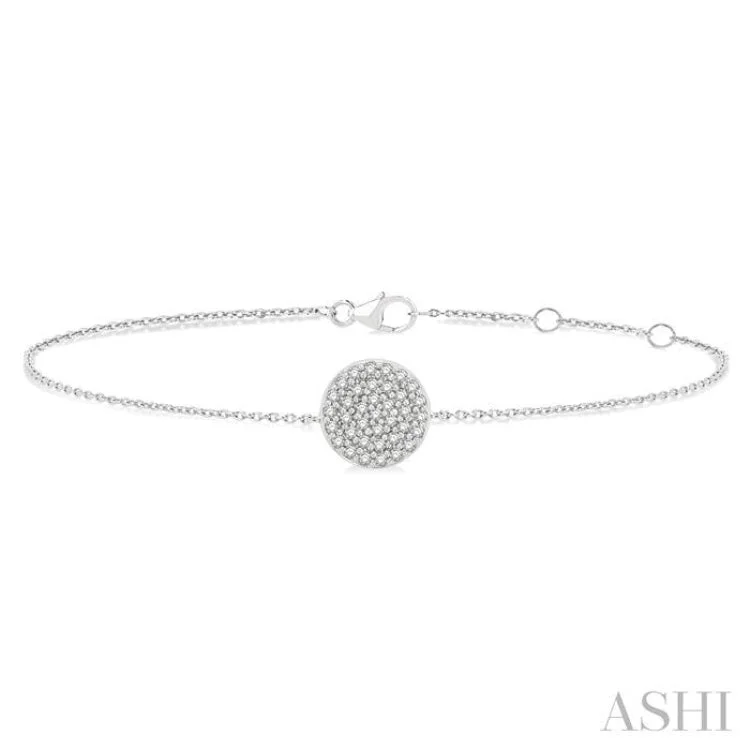 Ladies bracelets playful designs-1/6 ctw Petite Circular Disc Round Cut Diamond Fashion Bracelet in 10K White Gold