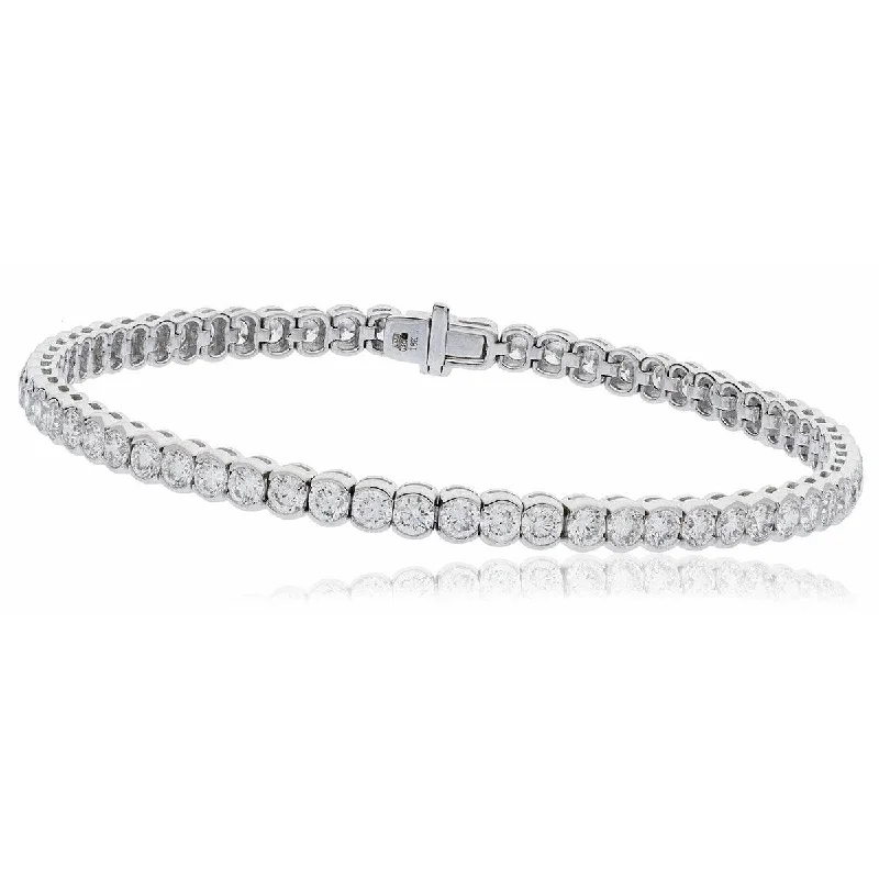 Ladies bracelets sibling sets-Round Cut Diamond Line Tennis Bracelet in Semi Bezel setting