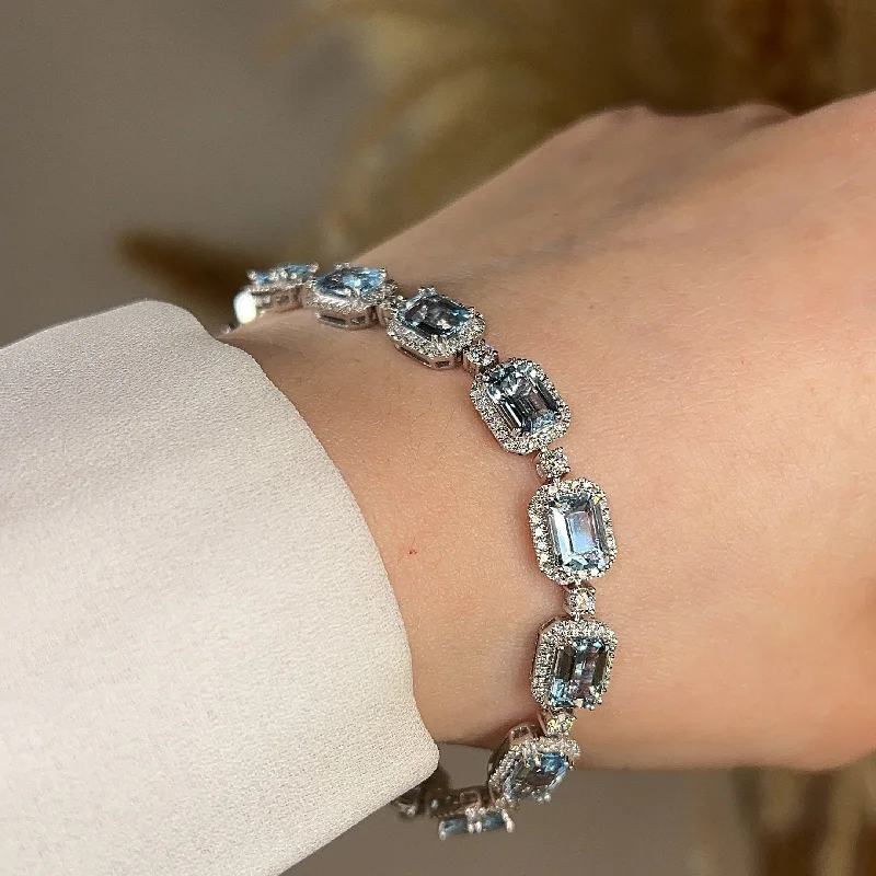 Ladies bracelets promo offers-Emerald Shape 11 Carat Aquamarine Tennis Bracelet Featuring Diamond Halo BRHAEC