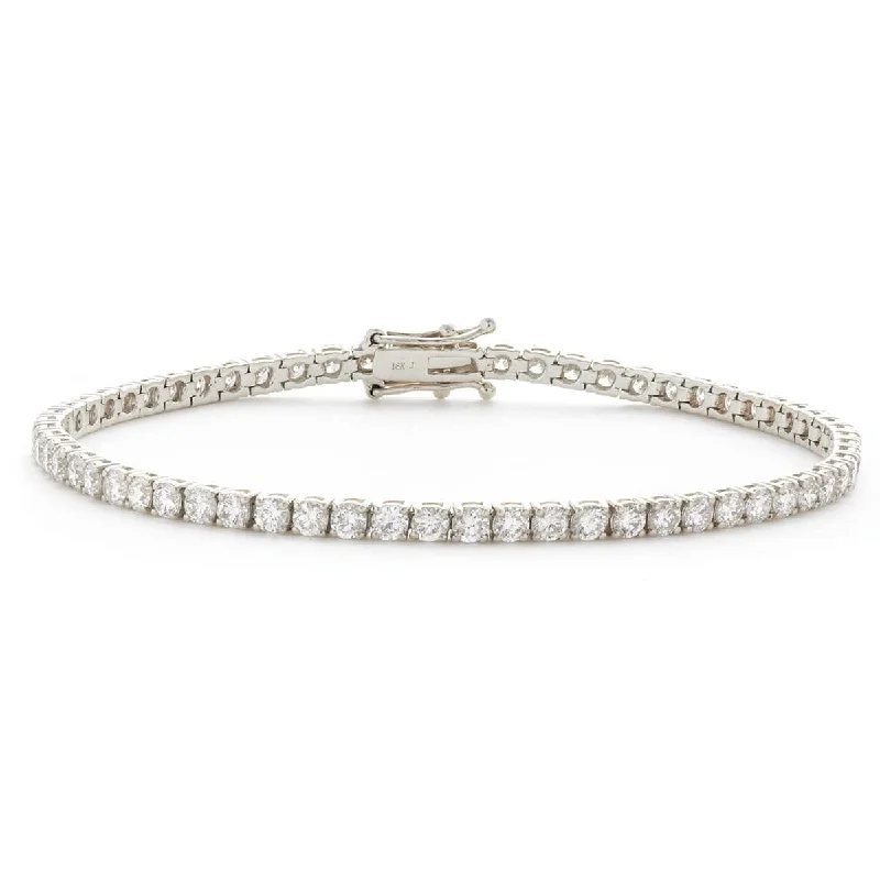 Ladies bracelets youthful looks-Round Cut Diamond Line Tennis Bracelet in Four Claw setting