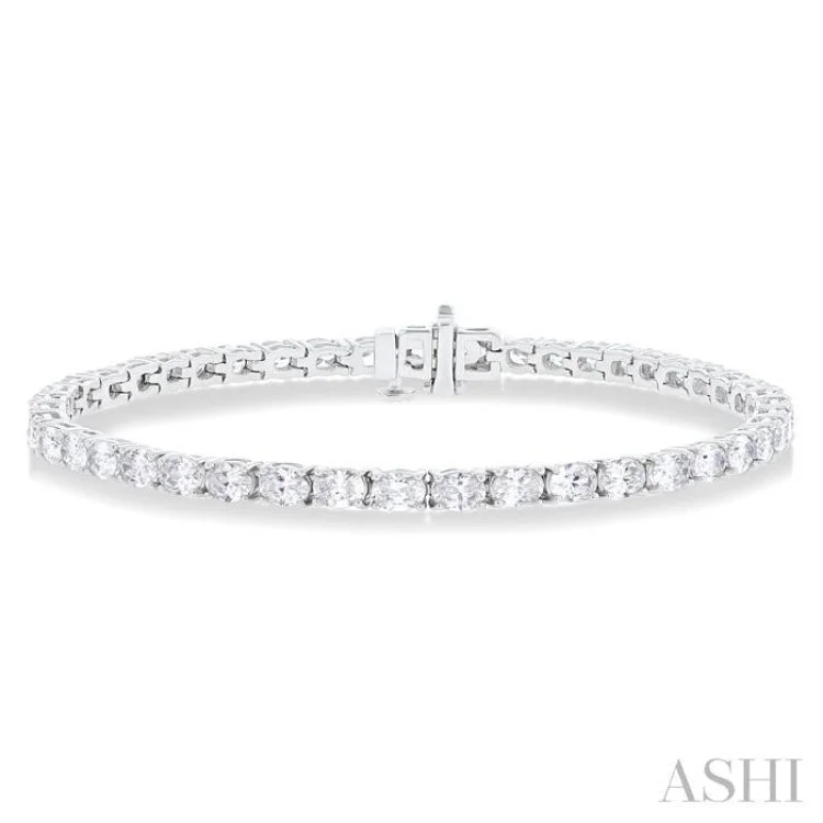 Ladies bracelets edgy styles-5 1/2 ctw East West Oval Cut Diamond Fashion Tennis bracelet in 14K White Gold