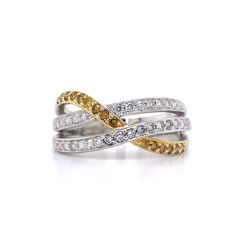 Ladies rings size guide-Estate Fancy Yellow and White Diamond Twist Ring in Two-Tone Gold by Simon G