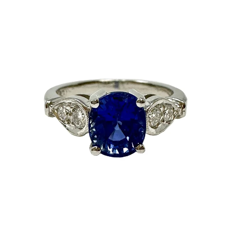 Ladies rings silver finishes-Platinum Ring with Sapphire and Diamond